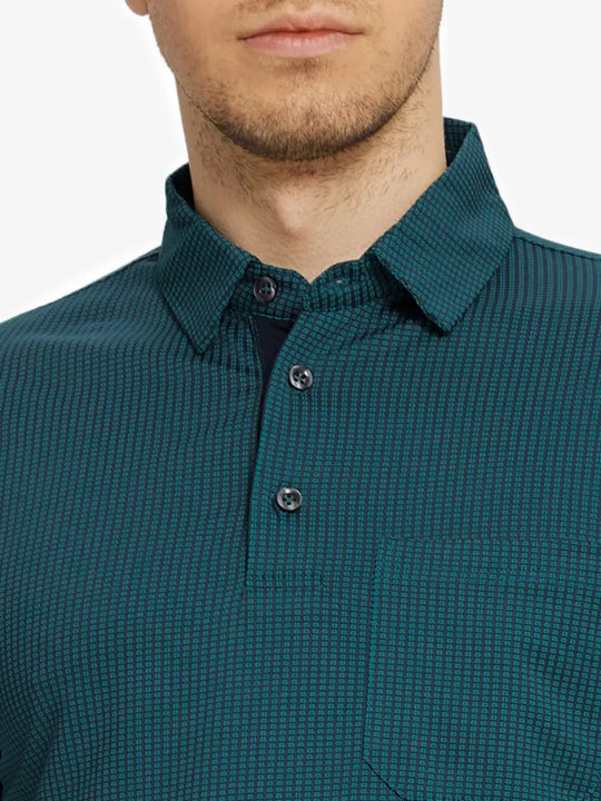 Model front view from nose to chest in TURQUOISE Elegant Performance Jacquard Polo