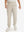 Model wearing light khaki fleece stretch water resistant boys joggers, front view showing lower body and pants.