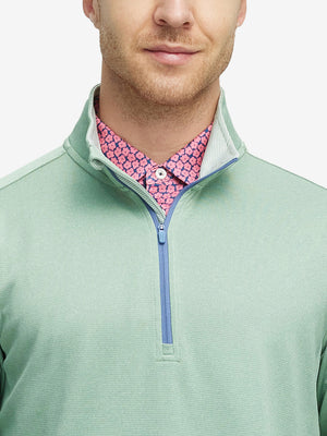 Front view from nose to chest of model wearing beryl green melange moisture wicking quarter zip pullover