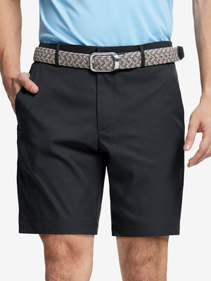 Front waist to knee view of black water resistant golf 9 inch shorts, clean athletic fit.