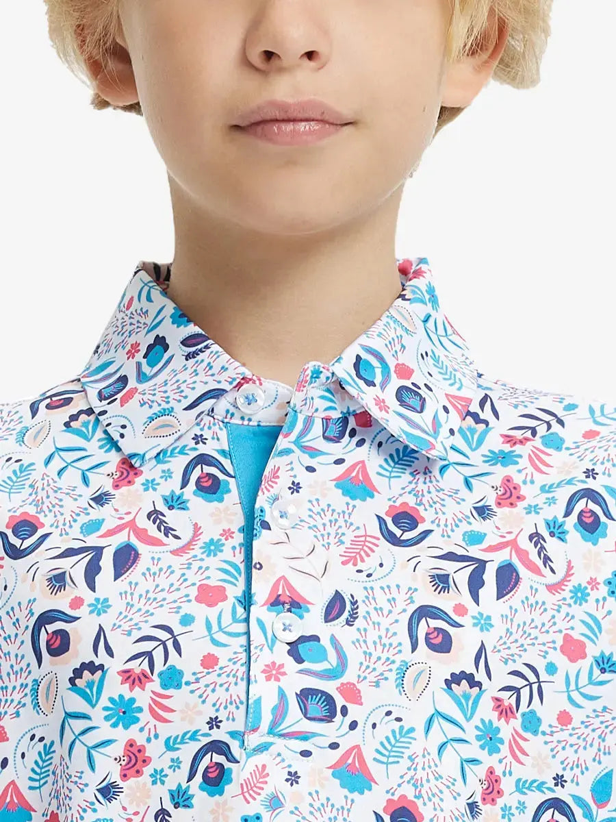 Close-up front view from nose to chest of boy wearing COLORFUL PLANTS Performance Print Boys Golf Polo