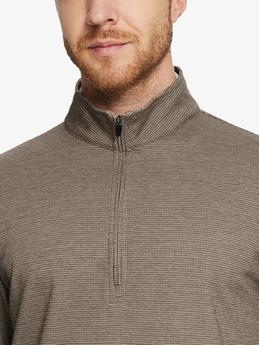 Front half-body view from nose down of model wearing BROWN HOUNDSTOOTH Premium Jacquard Quarter Zip Pullover.								
