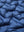 Fabric close-up showing the material of dark blue boys full-zip fleece-lined puffer vest.