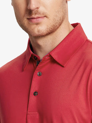 Male model wearing the Red Everyday Classic Solid Polo, front view from nose to chest