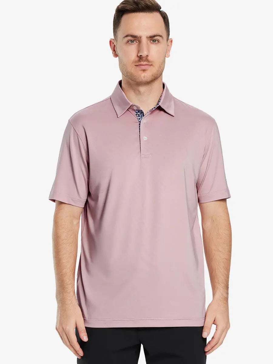 Front half-body view of male model in the Pale Pink Everyday Classic Solid Polo, standing still