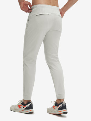Back view of khaki grey superion softness mesh joggers with zipper pockets
