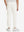 Model's lower body from the back, wearing beige fleece stretch water resistant boys joggers.