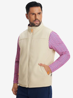 Model's front half-body shot with one hand in the pocket, wearing khaki windproof fleece reversible golf vest.