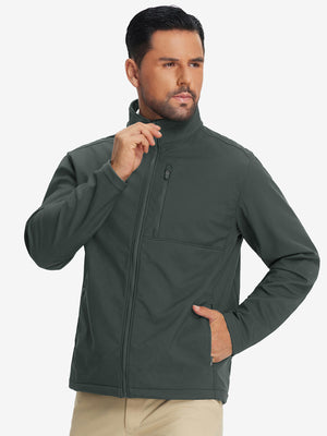 Model wearing winter thermal outdoor water resistant fleece jacket, hand in side pocket, relaxed fit in grey