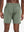 Back lower-body view from waist to upper calves in OLIVE GREEN 2 in 1 Running Sports Shorts with Liner