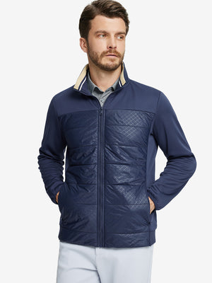 Front view of model with both hands in side pockets, wearing Golf Fleece Winter Jacket in Navy.