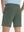 Back lower body view of model wearing the grey green stretch soft flat front dress golf shorts, highlighting the rear design
