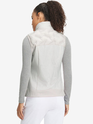 Back view of model in women's lightweight slim-fit puffer vest, showing shape and oyster grey tone