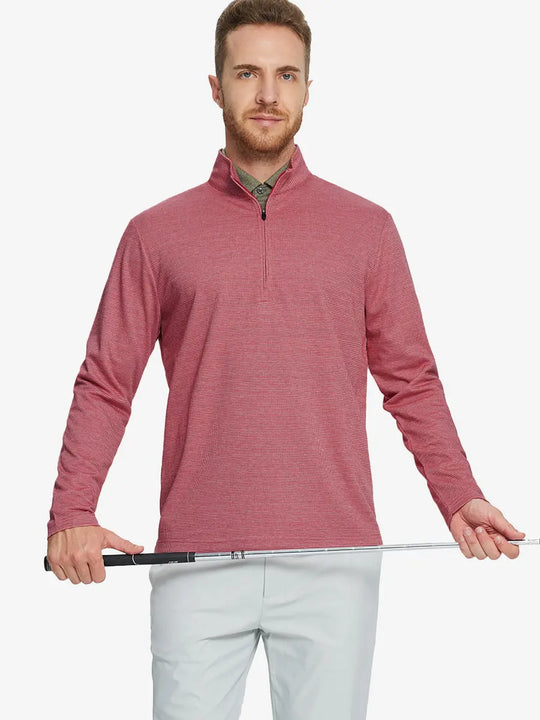 Half-body front view of model holding golf club wearing RED HOUNDSTOOTH Premium Jacquard Quarter Zip Pullover.								
