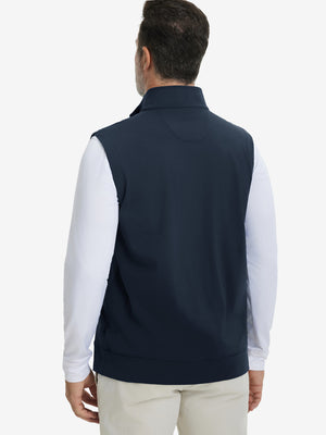 Back upper body view of the navy print collar quarter zip golf vest, clean cut and relaxed posture.
