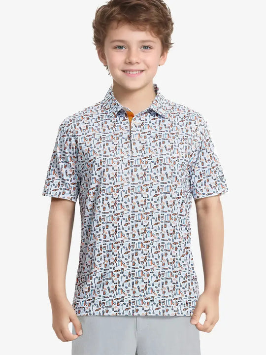 Front half-body shot of boy model in WHITE ORANGE PICNIC Performance Print Boys Golf Polo, ready to play