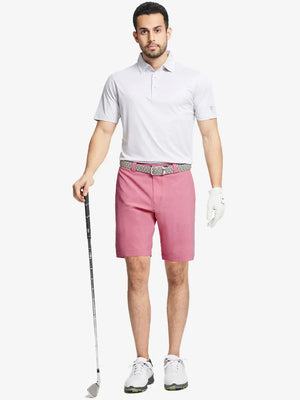Full body front view of model wearing PINK 9 Inch Heather Performance Golf Shorts, holding a golf club