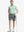 Full body front view of model wearing DARK GREY 7 Inch Heather Performance Golf Shorts, holding a golf club