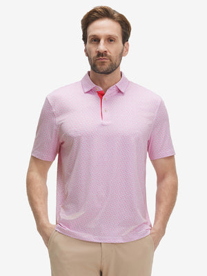 Male model front upper body wearing Performance quick dry print golf polos, sleek white pink floral look