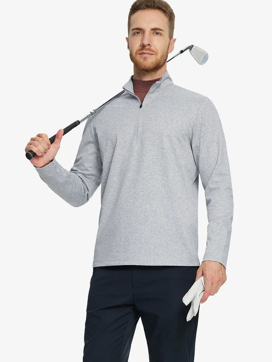 Half-body front view of model holding golf club wearing LIGHT GRAY HERRINGBONE Premium Jacquard Quarter Zip Pullover.								
