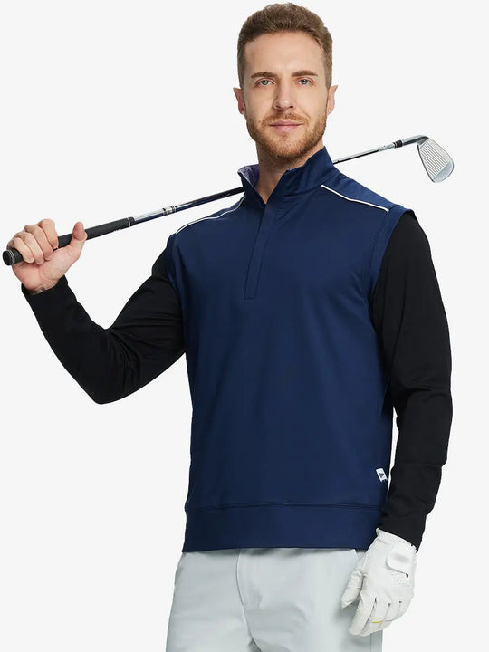 Half-body front view of model holding golf club wearing NAVY Stretch Solid Fleece Quarter-Zip Vest.								
