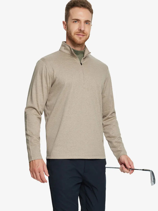 Half-body front view of model holding golf club wearing DARK KHAKI HERRINGBONE Premium Jacquard Quarter Zip Pullover.								
