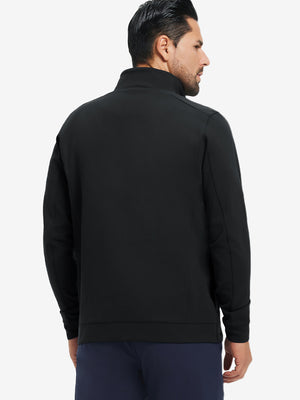Back upper-body view of water-resistant zip up golf jacket on model, shown in black.