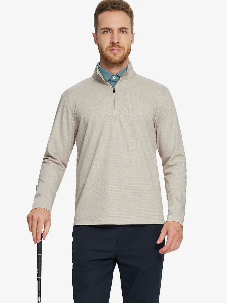 Half-body front view of model holding golf club wearing KHAKI HOUNDSTOOTH Premium Jacquard Quarter Zip Pullover.								

