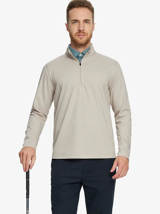 Half-body front view of model holding golf club wearing KHAKI HOUNDSTOOTH Premium Jacquard Quarter Zip Pullover.								

