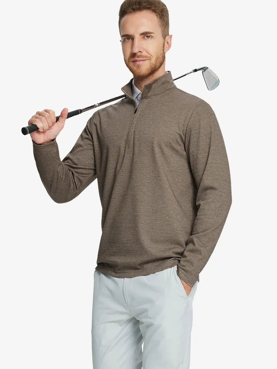 Half-body front view of model holding golf club wearing BROWN HOUNDSTOOTH Premium Jacquard Quarter Zip Pullover.								
