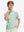 Front half-body of boy in leaves pineapple performance print boys golf polo