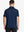 Back half-body view of male model wearing the Navy Everyday Classic Solid Polo