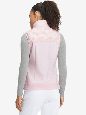 Back view of model in women's lightweight slim-fit puffer vest, showing shape and light pink tone