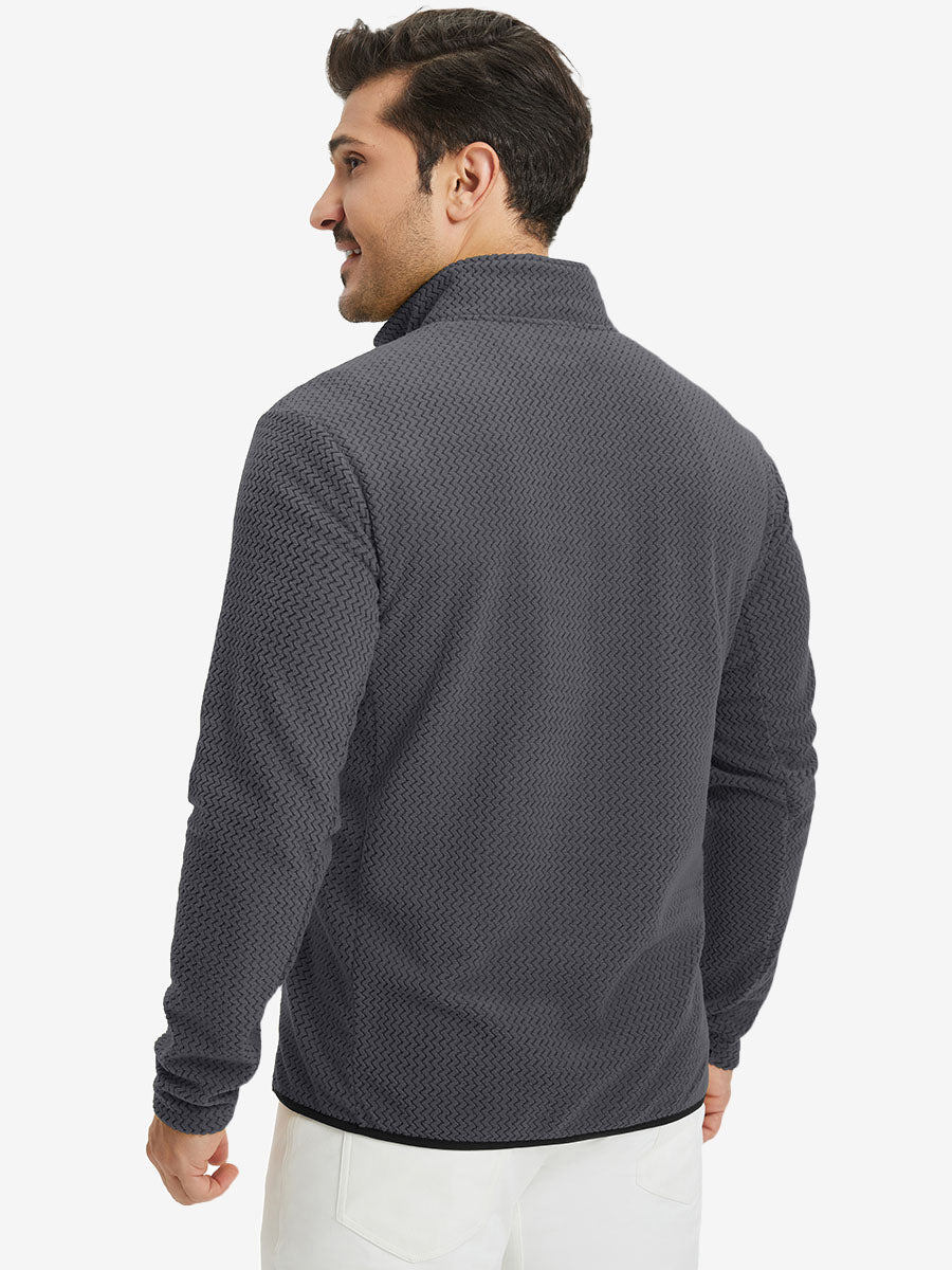 Back upper view of model in midweight warm stretchy quarter zip pullover, highlighting shoulder fit in grey.