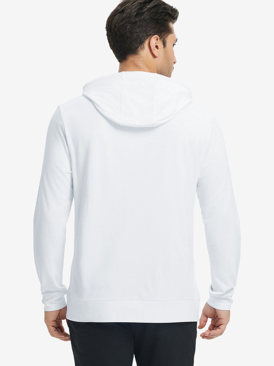 Back upper body view of the white classic heather hoodie, model turns head slightly with ease.