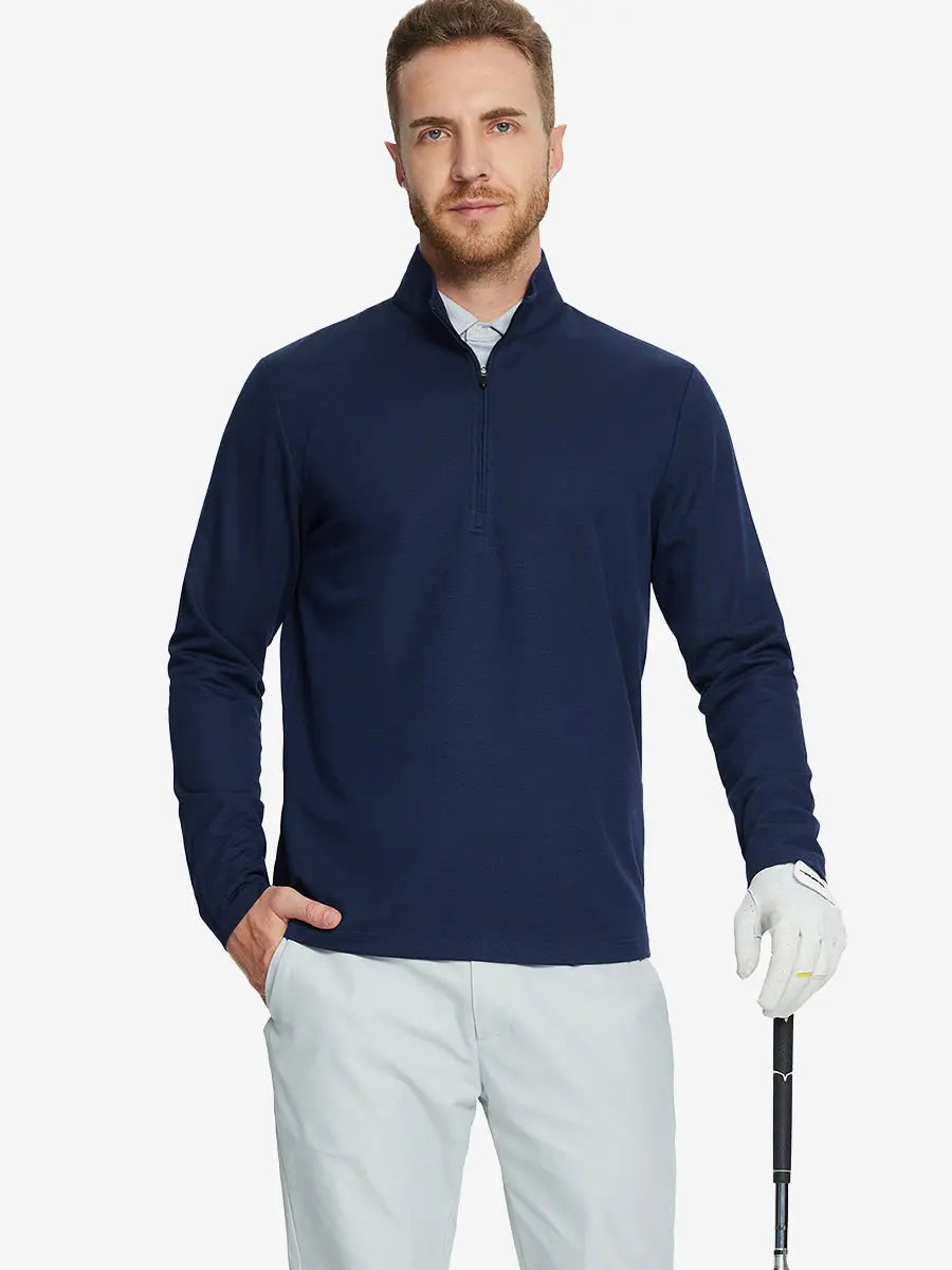 Half-body front view of model holding golf club wearing NAVY Premium Jacquard Quarter Zip Pullover.								
