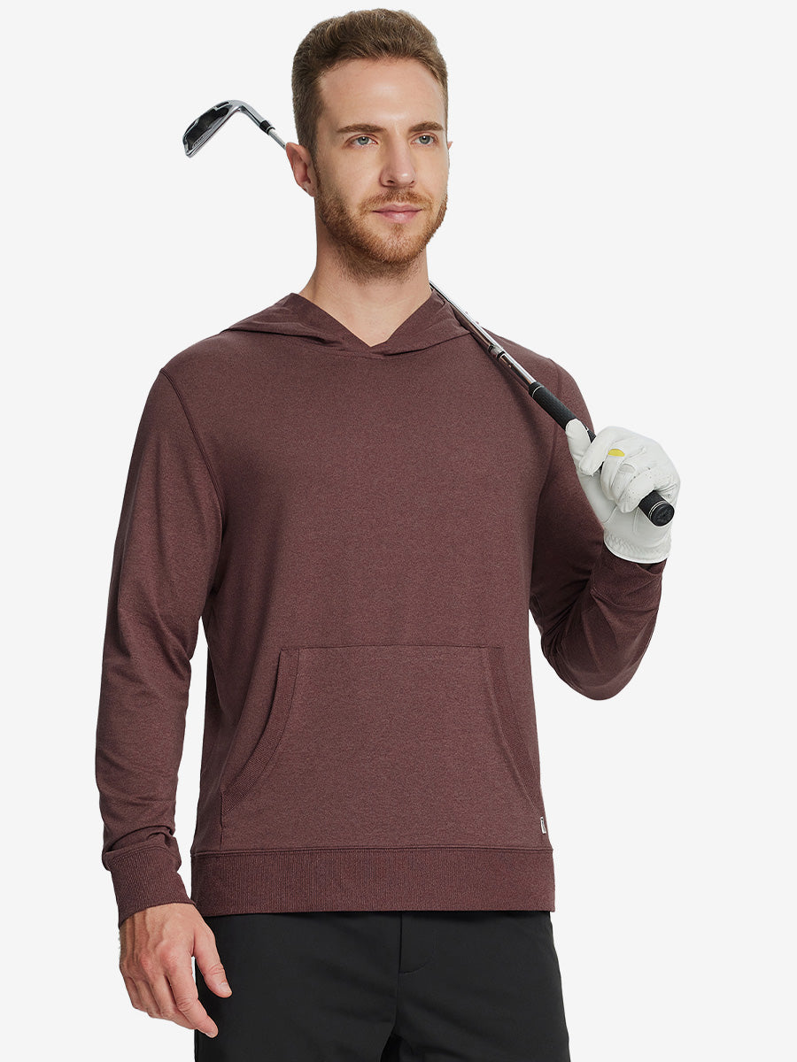Model holding a golf club, dressed in the Brick Heather Athletic Golf Hoodie with a sleek fit.
