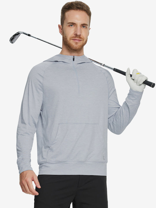 Male model holding a golf club, wearing the Quarter Zip Hoodie with Kangaroo Pocket in Faded Denim Heather.