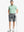 Full body front view of model wearing DARK GREY 9 Inch Heather Performance Golf Shorts, holding a golf club