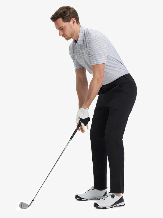 Full front view of model in Performance Water Resistant Pants BLACK，ready for golf with club in hand.