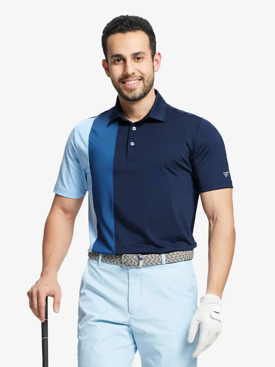 Half-body front view of model holding golf club wearing NAVY Moisture Wicking Color Block Polo Shirt.