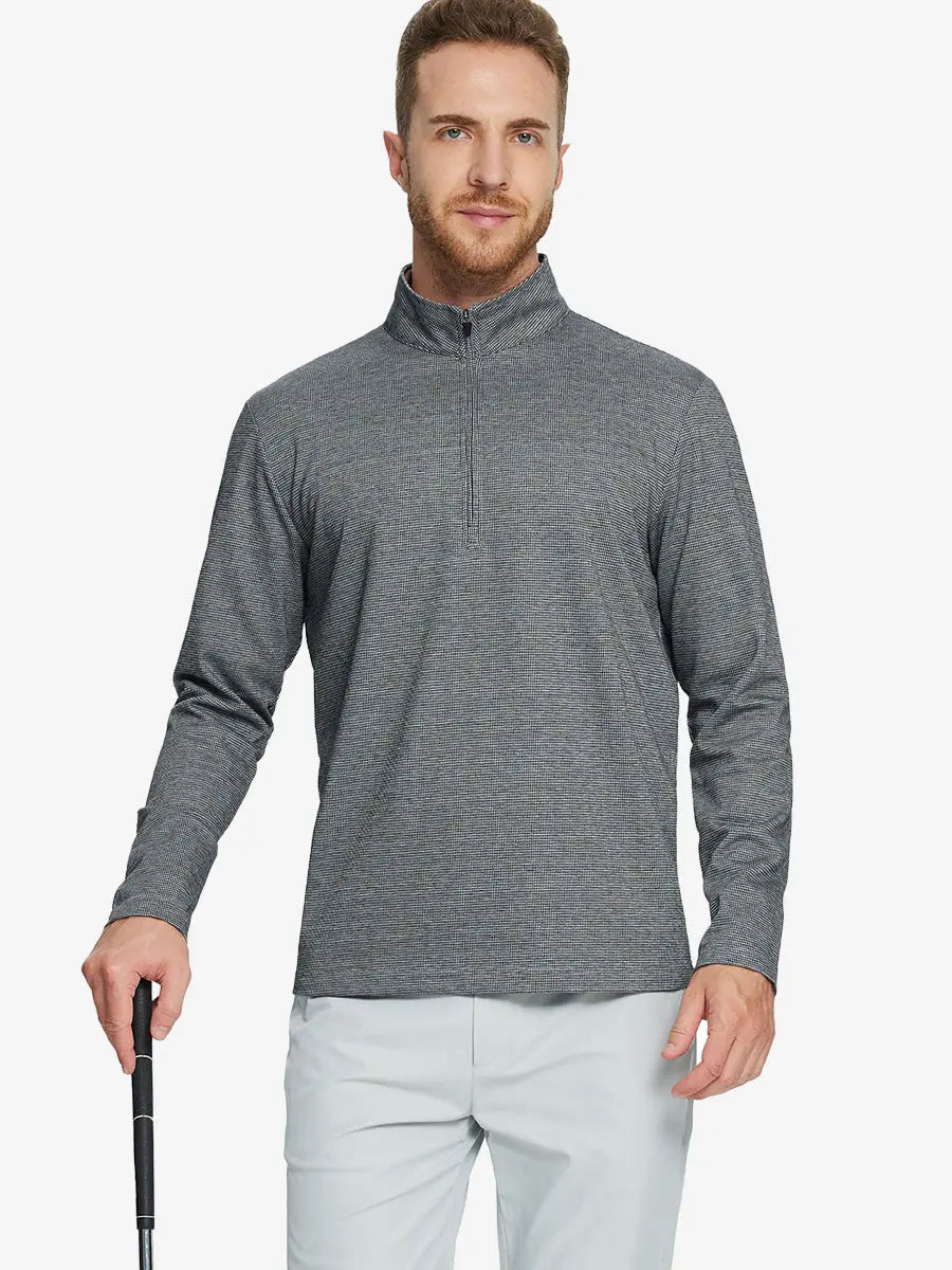Half-body front view of model holding golf club wearing BLACK HOUNDSTOOTH Premium Jacquard Quarter Zip Pullover.								
