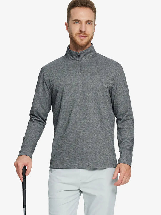 Half-body front view of model holding golf club wearing BLACK HOUNDSTOOTH Premium Jacquard Quarter Zip Pullover.								

