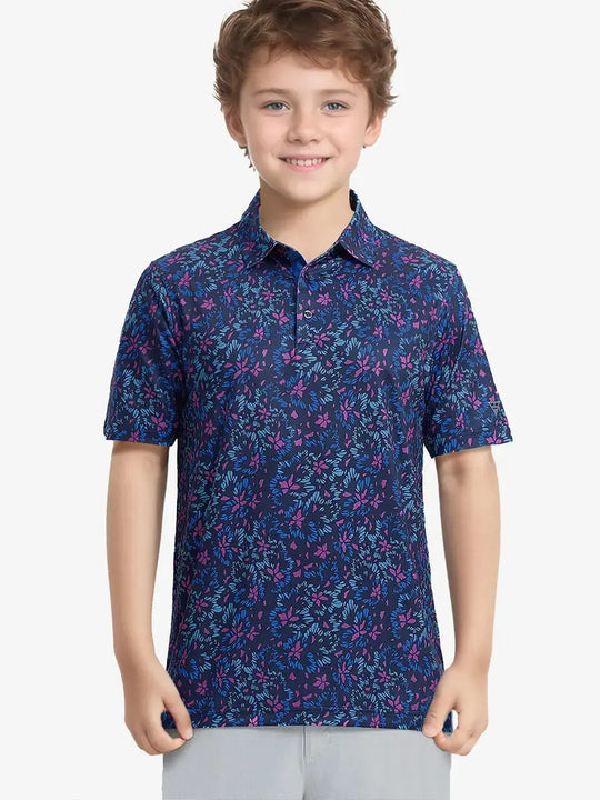 Front half-body shot of boy model in NAVY COLORFUL FLOWER Performance Print Boys Golf Polo, ready to play