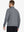 Back half-body view of model in BLACK GREY HEATHER Quarter Zip Melange Pullover highlighting smooth fit.