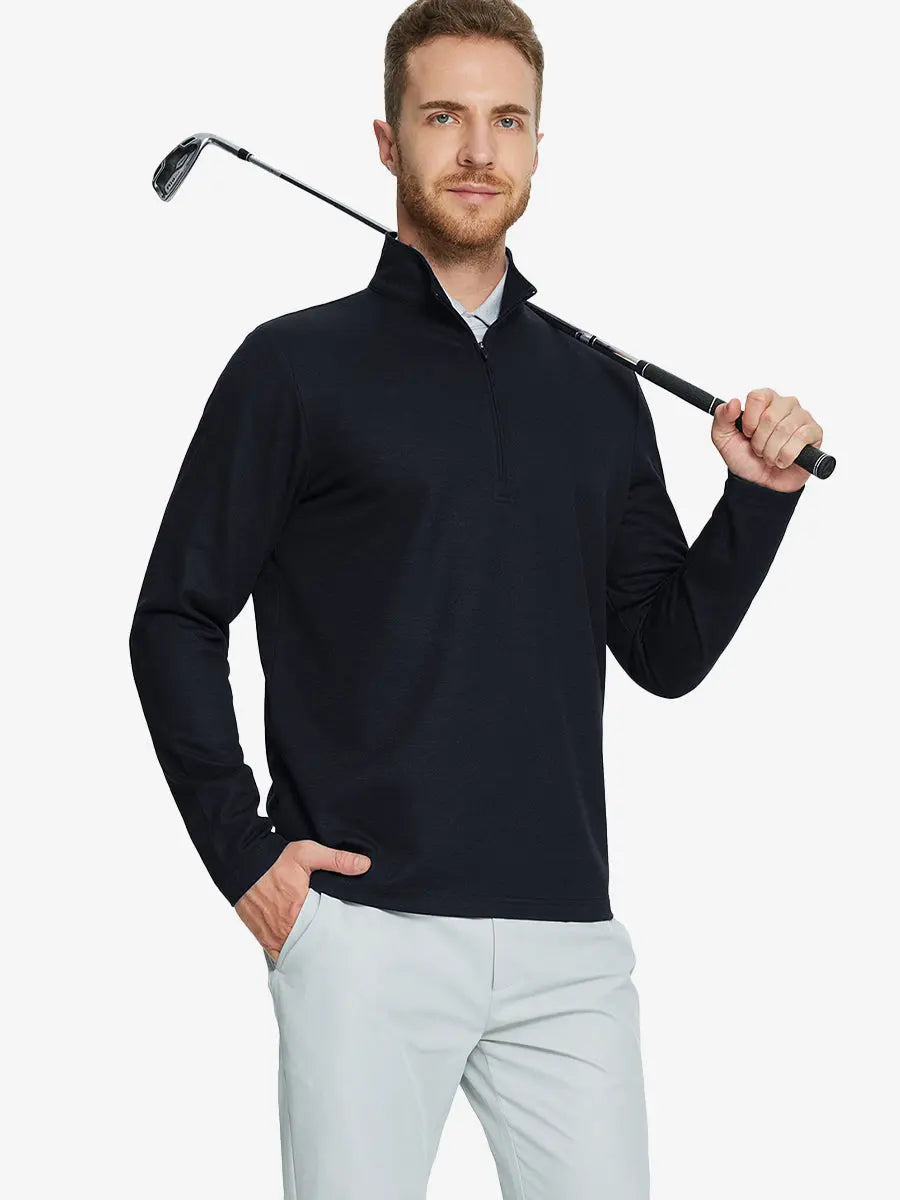 Half-body front view of model holding golf club wearing BLACK Premium Jacquard Quarter Zip Pullover.								

