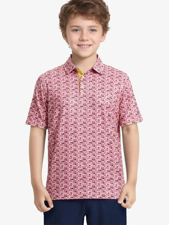 Boy holding golf club in PINK DONUT golf polo — fun meets performance on the course