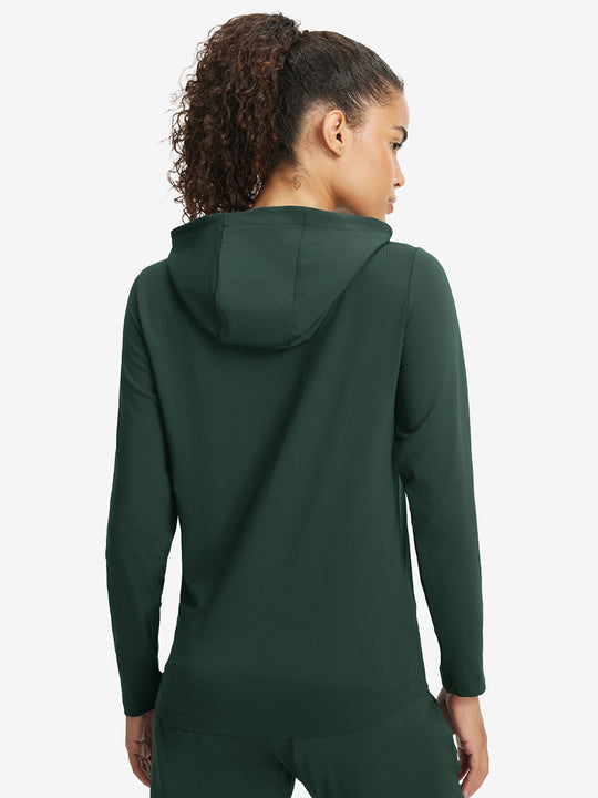 Back upper view of model in women's lightweight hoodies pullover, showing relaxed fit in forest green.