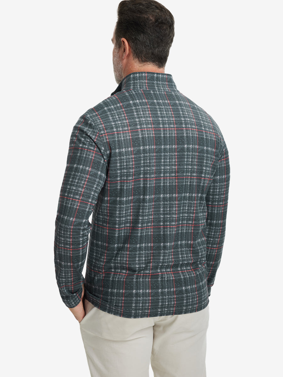 Back upper body angle of the retro black/red plaid full print quarter zip pullover, model turns head slightly.