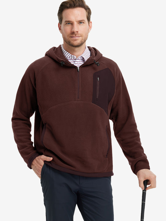 Model holding a golf club, dressed in Wine Red Quarter Zip Polar Fleece Sweatshirt, sporty fit.